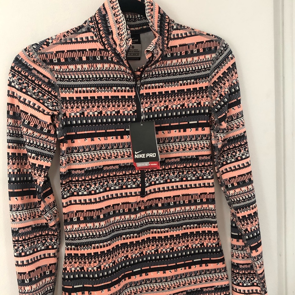 NIKE PRO Women’s Training jacket size XS. 1/4 zip pull over. New with tags.